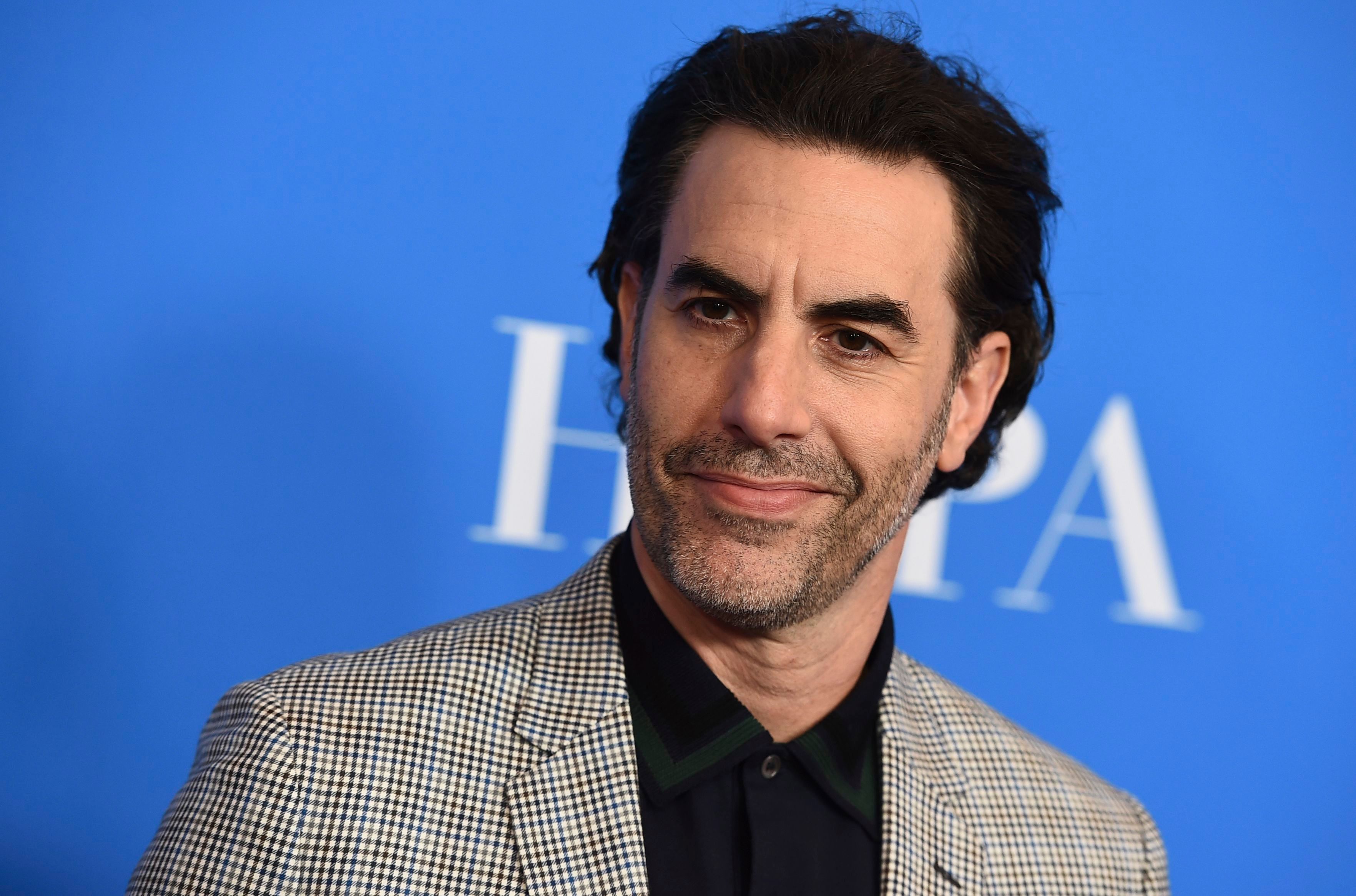 Sacha Baron Cohen Infiltrates Right-Wing Militia Event With Racist Sing-Along