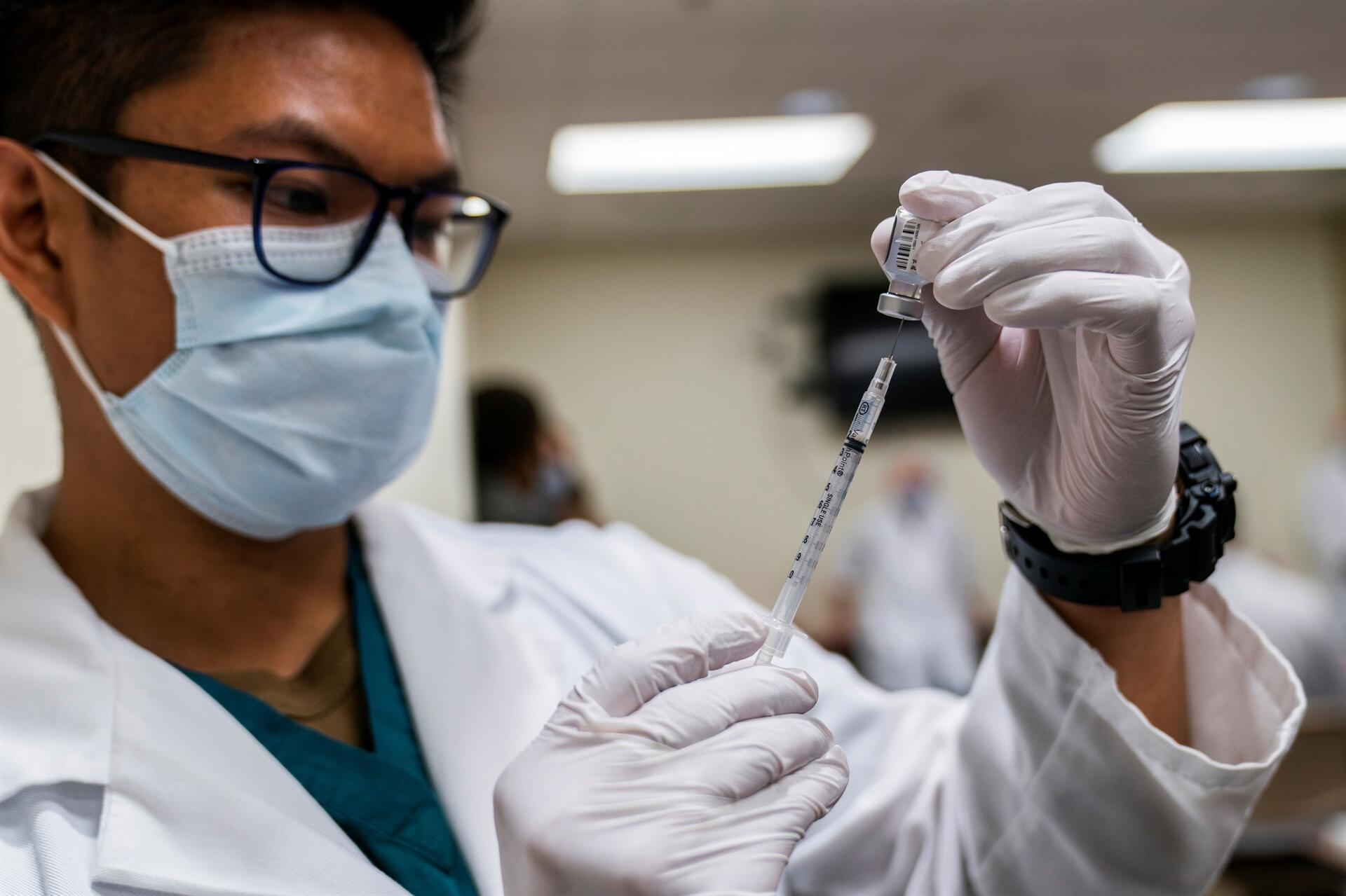 U.S. COVID-19 Death Toll Passes 300,000 as Vaccinations Begin